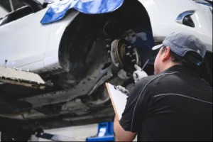 Disk brake pad wear automotive repairing on vehicle